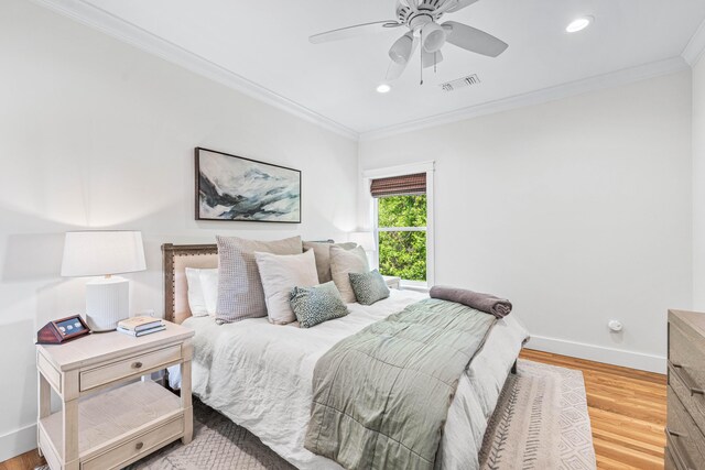 196 Summer Breeze Ln, Santa Rosa Beach, FL 32459 - bedroom with ornamental molding, baseboards, wood finished floors, recessed lighting, and a ceiling fan
