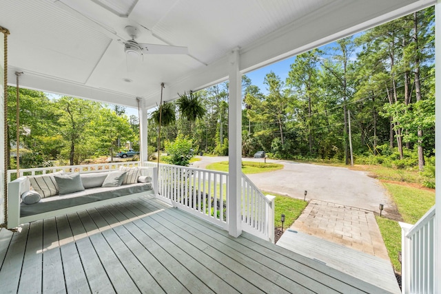 196 Summer Breeze Ln, Santa Rosa Beach, FL 32459 - porch featuring ceiling fan and view of wooded area