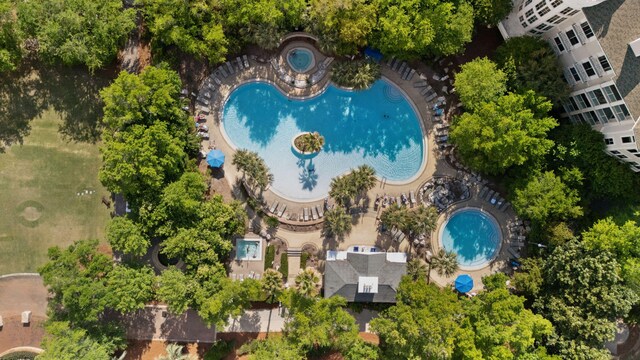 view of property location featuring a pool area