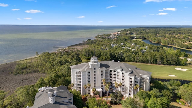 aerial view of a nearby body of water and apartment complex