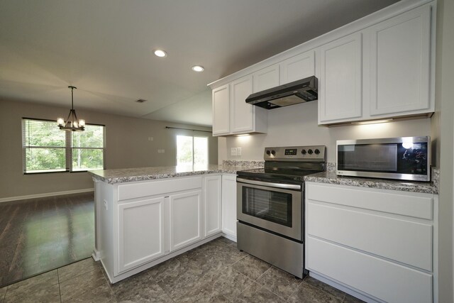 1422 Oakwood Lakes Blvd, Defuniak Springs, FL 32433 - kitchen with appliances with stainless steel finishes, under cabinet range hood, a peninsula, white cabinets, and a chandelier