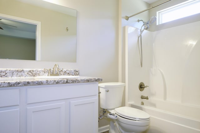 1422 Oakwood Lakes Blvd, Defuniak Springs, FL 32433 - bathroom featuring toilet, vanity, and  shower combination