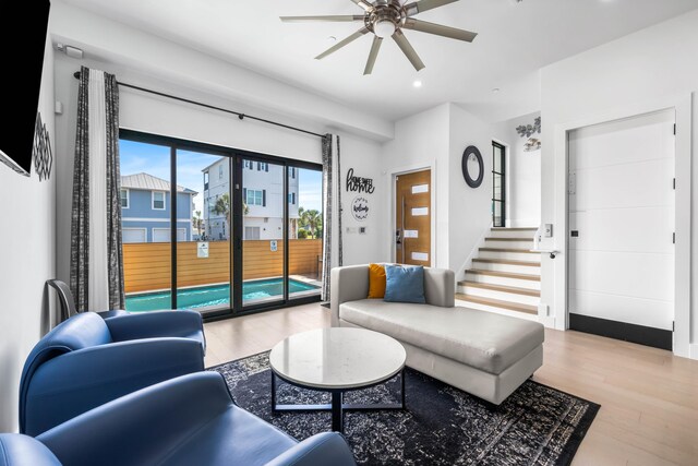21 Tidewater Ct, Inlet Beach, FL 32461 - living room featuring a ceiling fan, wood finished floors, recessed lighting, and stairway