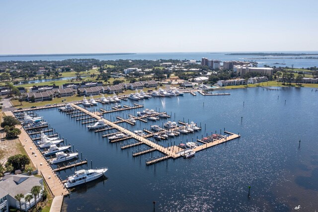bird's eye view of a marina and a nearby body of water