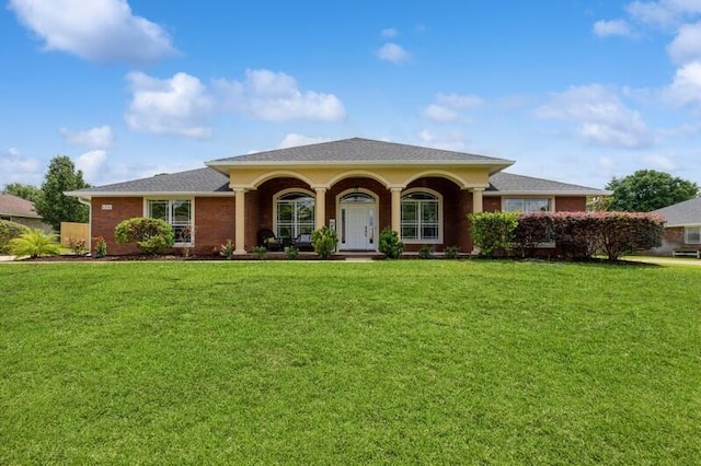 6216 Plum Orchard Way, Crestview, FL 32536 - ranch-style house with a front yard and brick siding