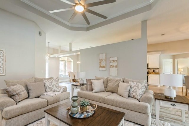 6216 Plum Orchard Way, Crestview, FL 32536 - living room with ceiling fan, crown molding, and a raised ceiling
