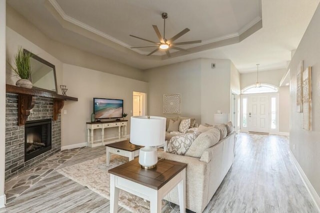 6216 Plum Orchard Way, Crestview, FL 32536 - living area with a ceiling fan, wood finished floors, baseboards, and ornamental molding