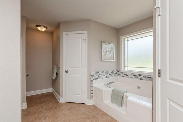 6216 Plum Orchard Way, Crestview, FL 32536 - full bathroom with tile patterned flooring, a bath, and baseboards