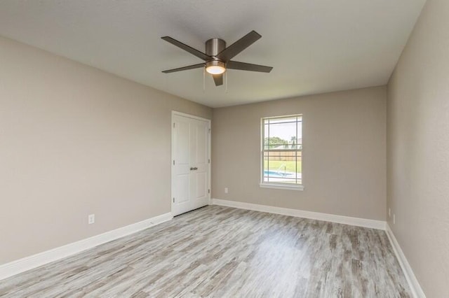 6216 Plum Orchard Way, Crestview, FL 32536 - spare room featuring light wood finished floors, ceiling fan, and baseboards