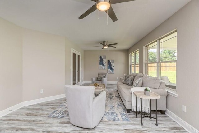 6216 Plum Orchard Way, Crestview, FL 32536 - living room with ceiling fan, light wood-type flooring, and baseboards