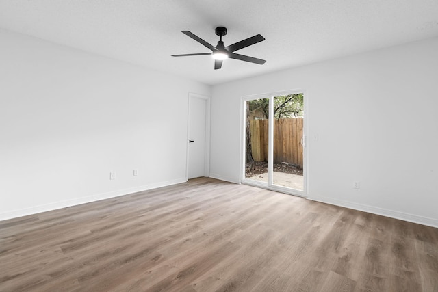 1725 Colonial Ct, Fort Walton Beach, FL 32547 - spare room featuring wood finished floors, a ceiling fan, and baseboards