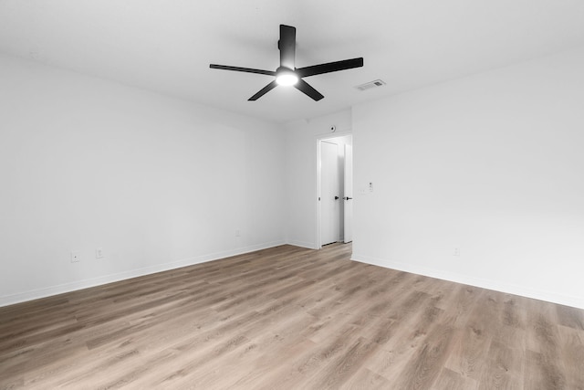 1725 Colonial Ct, Fort Walton Beach, FL 32547 - empty room with wood finished floors, ceiling fan, and baseboards
