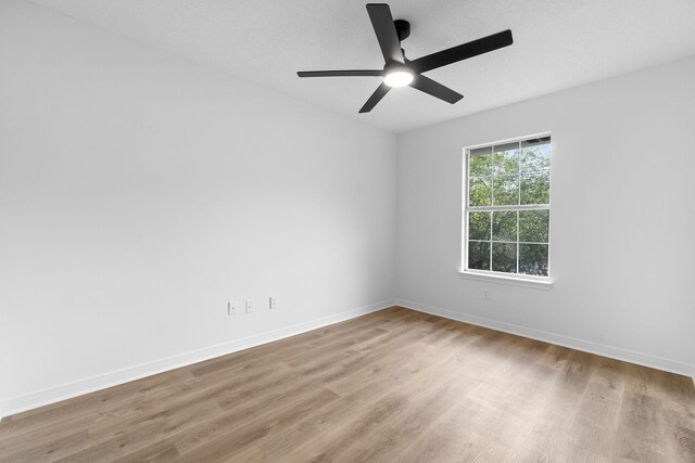 1725 Colonial Ct, Fort Walton Beach, FL 32547 - empty room featuring wood finished floors, baseboards, and ceiling fan