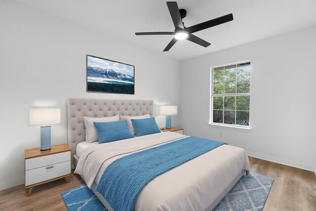 1725 Colonial Ct, Fort Walton Beach, FL 32547 - bedroom featuring wood finished floors, baseboards, and a ceiling fan