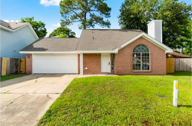1725 Colonial Ct, Fort Walton Beach, FL 32547 - view of front of home with a garage, a chimney, brick siding, and concrete driveway