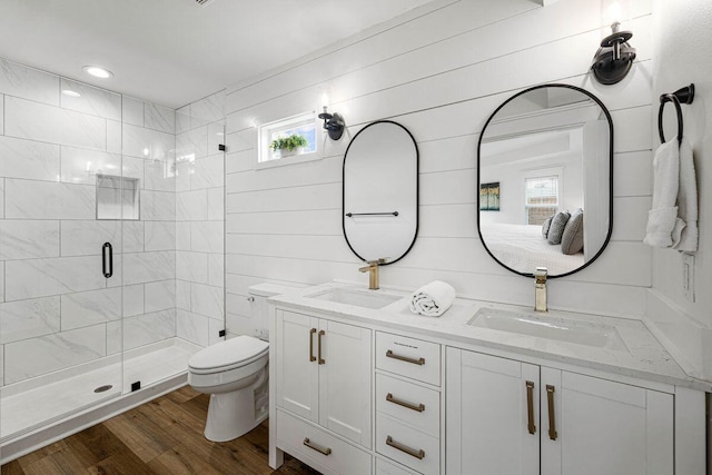 65 Brown St, Santa Rosa Beach, FL 32459 - full bath with a shower stall, double vanity, toilet, and plenty of natural light