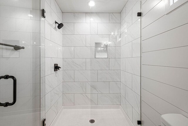 65 Brown St, Santa Rosa Beach, FL 32459 - bathroom featuring a stall shower and toilet