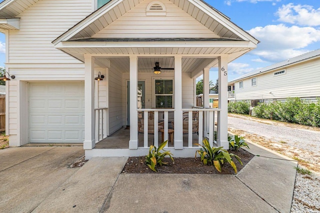 65 Brown St, Santa Rosa Beach, FL 32459 - view of front of property with covered porch, concrete driveway, ceiling fan, and a garage