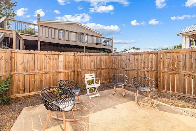 65 Brown St, Santa Rosa Beach, FL 32459 - fenced backyard with a patio area