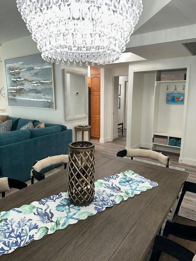 1096 Scenic Gulf Dr Ph 1610, Miramar Beach, FL 32550 - dining space featuring light wood-type flooring and baseboards