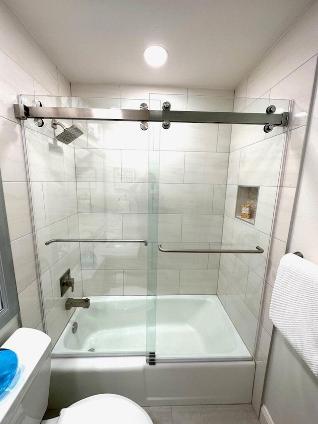 1096 Scenic Gulf Dr Ph 1610, Miramar Beach, FL 32550 - bathroom with toilet and shower / bath combination with glass door