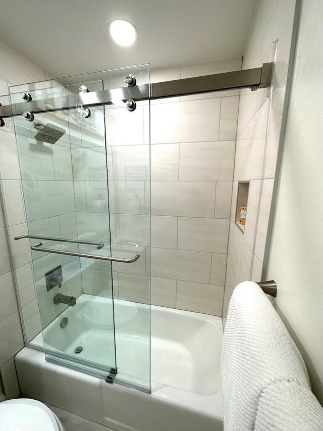 1096 Scenic Gulf Dr Ph 1610, Miramar Beach, FL 32550 - bathroom featuring enclosed tub / shower combo and toilet