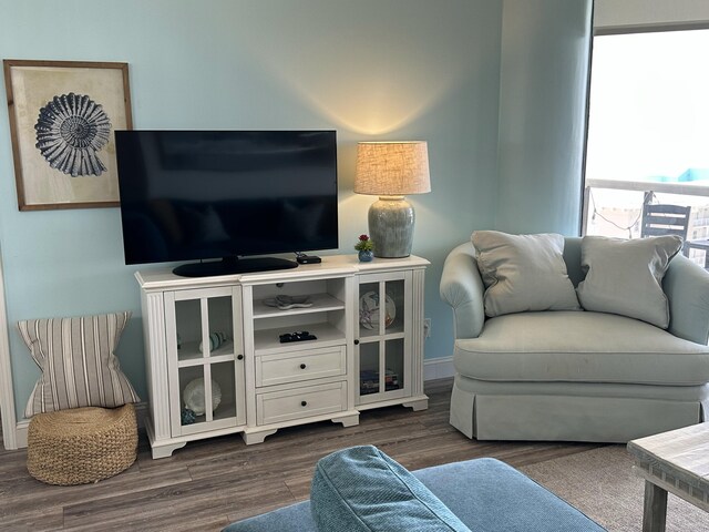 1096 Scenic Gulf Dr Ph 1610, Miramar Beach, FL 32550 - living room with dark wood-style floors and baseboards