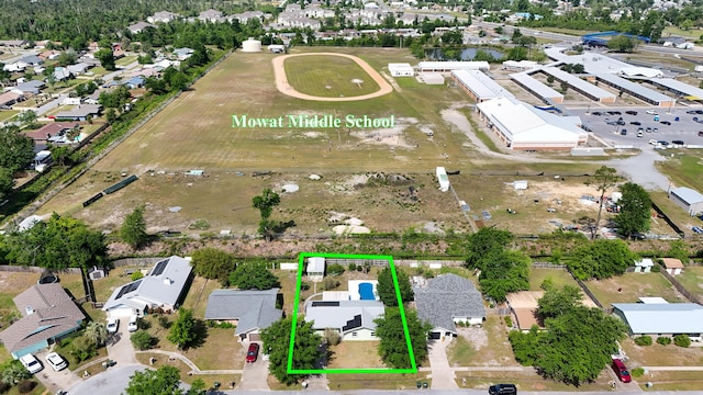 aerial perspective of suburban area featuring property parcel outlined
