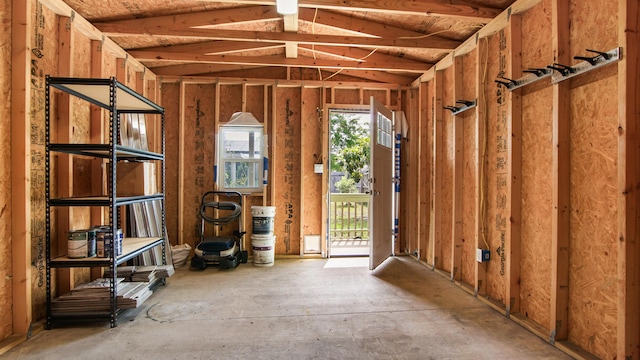 misc room featuring lofted ceiling