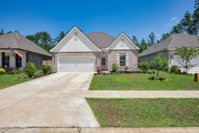 view of front of house featuring brick siding, an attached garage, concrete driveway, and a front lawn