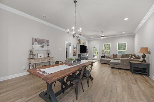 dining space featuring a ceiling fan, light wood finished floors, recessed lighting, baseboards, and a chandelier