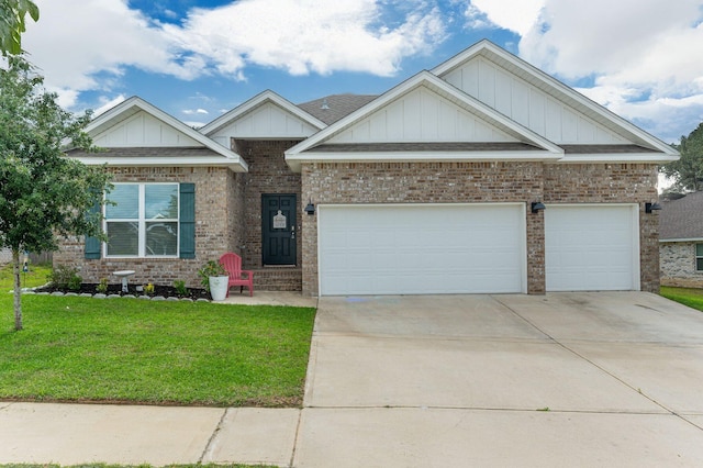 1126 Valor Walk, Crestview, FL 32539 - craftsman inspired home featuring board and batten siding, brick siding, a front lawn, driveway, and a garage