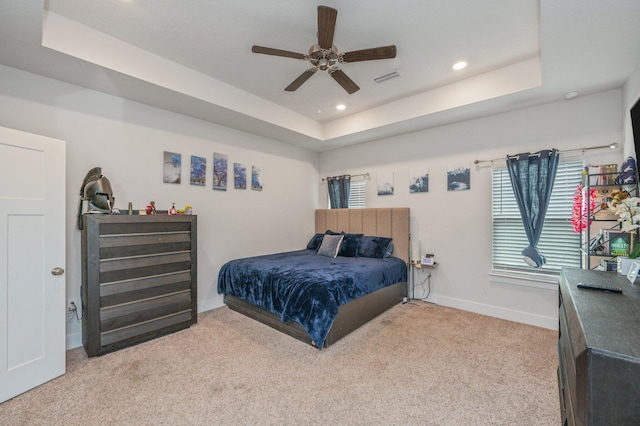 1126 Valor Walk, Crestview, FL 32539 - bedroom featuring a raised ceiling, light colored carpet, baseboards, recessed lighting, and a ceiling fan