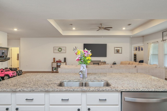 1126 Valor Walk, Crestview, FL 32539 - kitchen with open floor plan, dishwasher, a raised ceiling, a sink, and recessed lighting