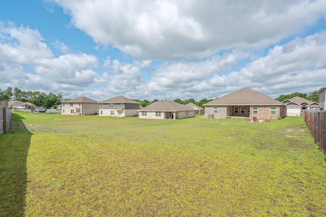 1126 Valor Walk, Crestview, FL 32539 - view of yard featuring a residential view and a patio