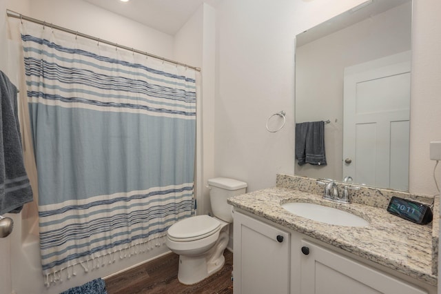 1126 Valor Walk, Crestview, FL 32539 - full bath with wood finished floors, toilet, vanity, and shower / tub combo