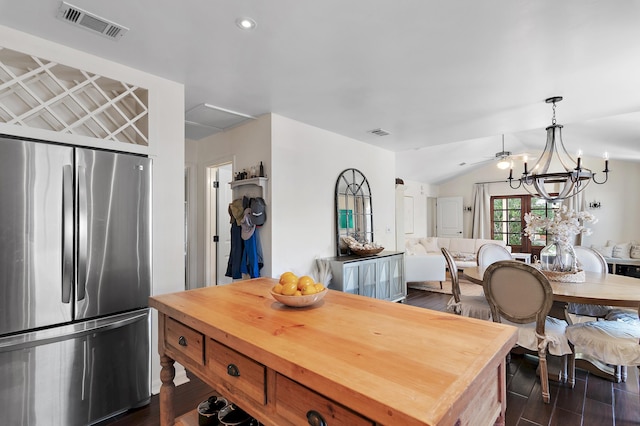 4485 Luke Ave Unit B, Destin, FL 32541 - kitchen with freestanding refrigerator, open floor plan, dark wood-type flooring, vaulted ceiling, and a chandelier