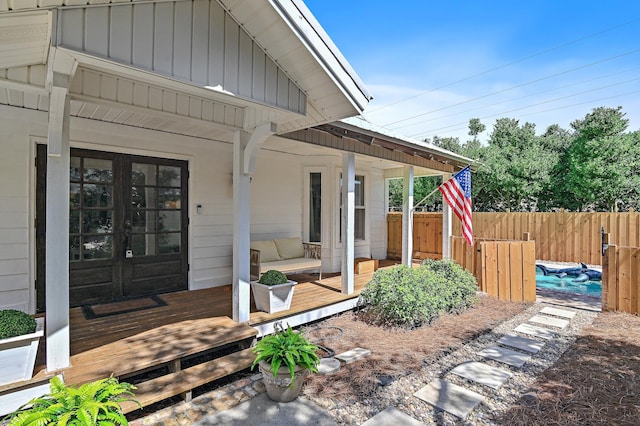 4485 Luke Ave Unit B, Destin, FL 32541 - property entrance with french doors, a deck, and fence
