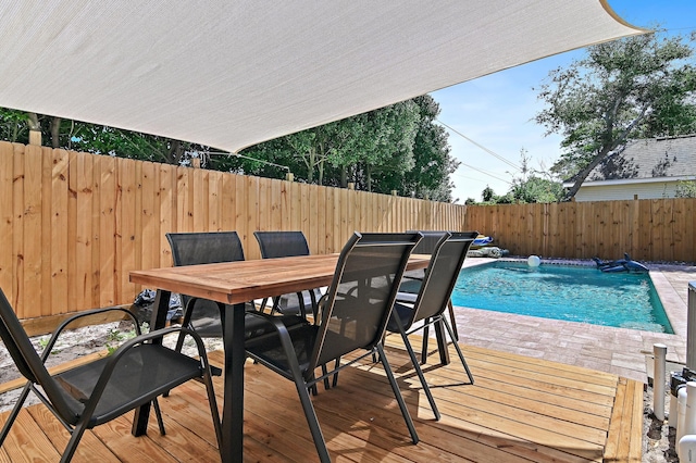 4485 Luke Ave Unit B, Destin, FL 32541 - wooden deck with a fenced backyard and outdoor dining area