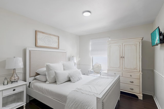 4485 Luke Ave Unit B, Destin, FL 32541 - bedroom with dark wood-style flooring and baseboards