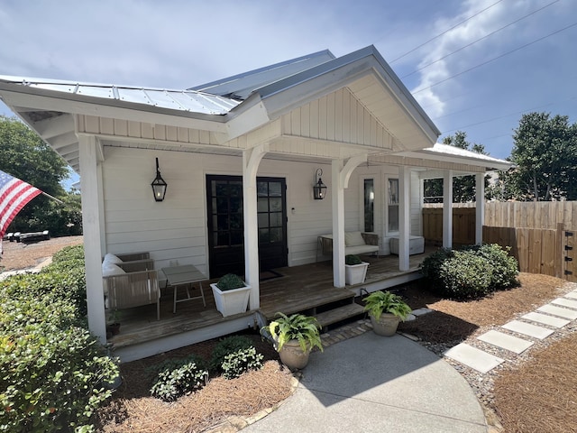4485 Luke Ave Unit B, Destin, FL 32541 - view of front of house with covered porch and metal roof