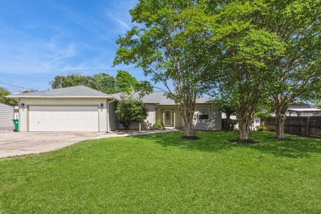 84 12th St, Shalimar, FL 32579 - single story home featuring concrete driveway and an attached garage
