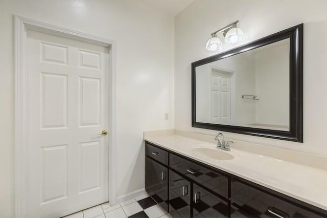 84 12th St, Shalimar, FL 32579 - bathroom featuring vanity, baseboards, and tile patterned flooring