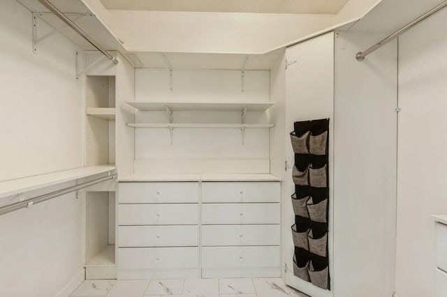 84 12th St, Shalimar, FL 32579 - spacious closet featuring light marble finish floors