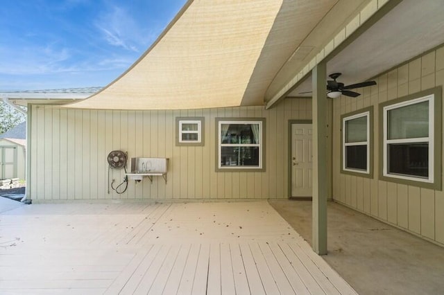 84 12th St, Shalimar, FL 32579 - wooden deck with a ceiling fan