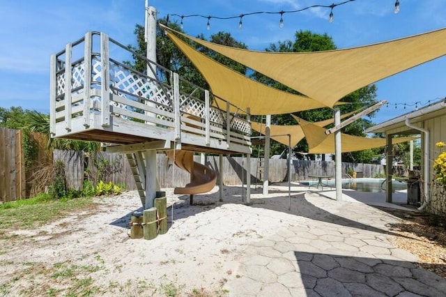 84 12th St, Shalimar, FL 32579 - view of patio / terrace with a fenced backyard and a wooden deck