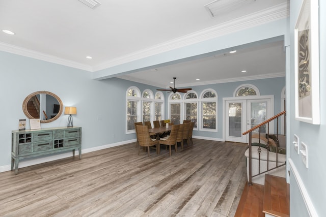 dining area with ceiling fan, wood finished floors, baseboards, ornamental molding, and recessed lighting