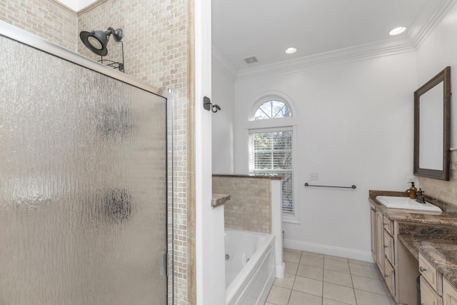 bathroom featuring crown molding, a stall shower, tile patterned flooring, vanity, and a tub with jets