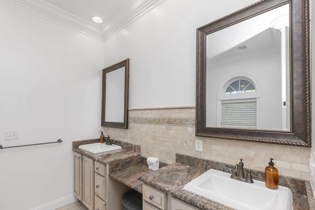 bathroom with ornamental molding, vanity, and backsplash