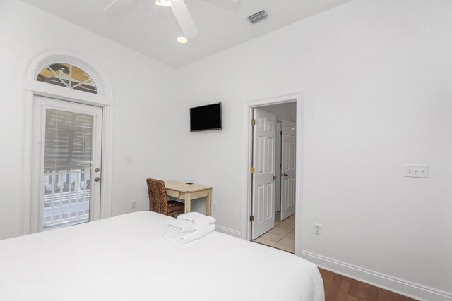 55 The Greenway Loop, Inlet Beach, FL 32461 - bedroom with access to exterior, baseboards, ceiling fan, and wood finished floors